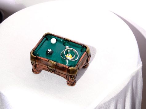 "Every billiards fanatic will love my cute, mini pool table, hand sculpted from artist grade brown and green polymer clay. The 8 ball, 9 ball and the white ball present on the green surface, ready for you to place your rings on for safe keeping. A perfect and unique gift for your avid billiards player loved one or friend! This original hand sculpted polymer clay piece I make when you order, each is totally made by my hand, so minor accent finishes and tiny details can differ each time in a sligh Mini Pool Table, Mini Pool, How To Make Clay, Pottery Crafts, 8 Ball, Clay Art Projects, Pool Table, Pottery Painting, Ring Dish