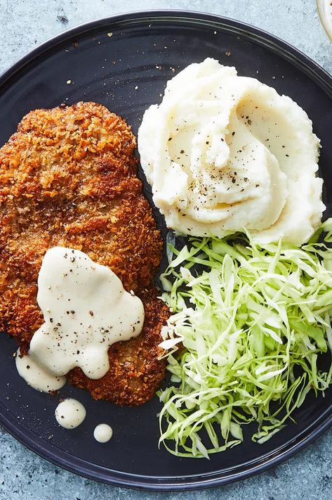 Our chicken-fried steak recipe is pretty classic, save for the panko breading (which, for me, fries up way crispier and requires less time in the oil than the traditional flour-egg-flour situation). Milk Gravy Recipe, Fried Mashed Potatoes, Feeling Homesick, Chicken Fried Steak Recipe, Milk Gravy, Fried Steak Recipes, Country Fried Steak, Fried Steak, Cube Steak