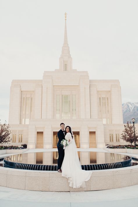 alice shoots people, ogden utah temple, ogden wedding, ogden utah temple wedding, utah wedding photographer, modest wedding gown, long sleeve lace wedding dress, bride with long veil, tunnel springs park wedding photos, bride and groom, groom in navy suit, bride and groom pose ideas, bountiful tunnel springs park, bride and groom with dark hair, gold doors, homemade wedding bouquet Ogden Utah Temple, Ogden Temple Wedding, Gold Doors, Wedding Gown Long Sleeve, Dark Academia Wedding, Temple Wedding Pictures, Ogden Temple, Temple Wedding Photos, Suit Bride