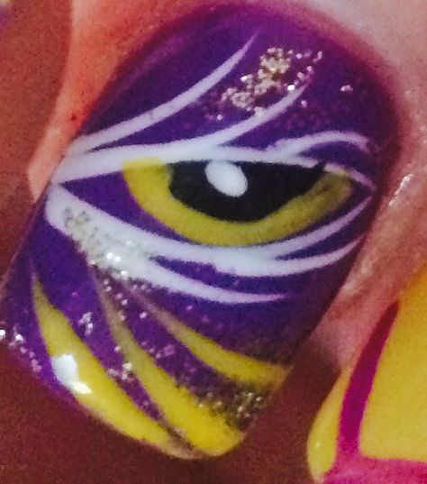 LSU tiger eye nail art Lsu Nails Designs Purple Gold, Lsu Nails Designs, Lsu Nails, Ravens Nails, Baltimore Ravens Nails, Nail Art Purple, Tiger Nails, Watermelon Color, Eye Nail Art