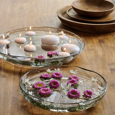 Hand turned from a single block of teak. These bowls and trays proudly display the rings and patterns of the honoured trees that sired them. They are almost too beautiful to cover with food or accoutrements. | Millwood Pines Chiku Tray-7.9 dia x .6 Brown 9.8 x 9.8 in | CBLK2162_88492310 | Wayfair Canada Large Bowl Centerpiece, Glass Bowl Centerpieces, Glass Bowl Decor, Teak Tray, Teak Bowl, Clear Bowls, Candle Displays, Wood Bowl, Floating Candles