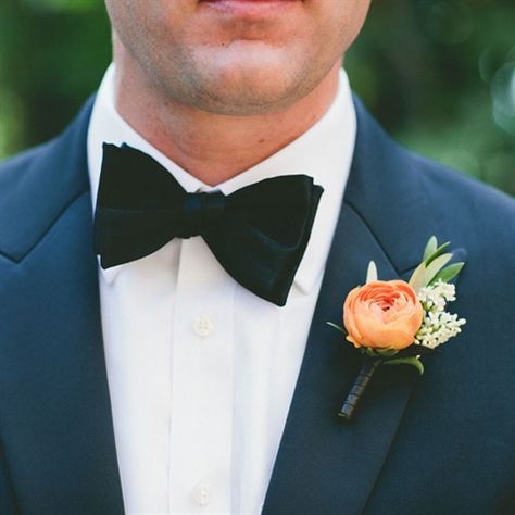 The groom's boutonniere will be an orange ranunculus, pink astilbe and green bay laurel wrapped in navy ribbon with the stems showing. Indian Wells California, Orange Boutonniere, Ranunculus Wedding Bouquet, Ranunculus Boutonniere, Peach Ranunculus, Orange Ranunculus, Navy Ribbon, Groomsmen Boutonniere, Teal Wedding