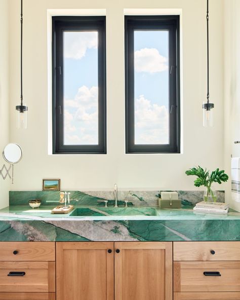 We are in awe over this space by @cgsdesignbuild featuring our Botanic Wave Premium Quartzite. The striking stone, paired with the warm wood cabinetry and ample natural light, creates a soothing and inviting atmosphere. Natural Light, Stone, Wood, Quick Saves