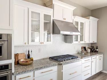 Herringbone Kitchen Backsplash Ideas and Inspiration | Hunker Gray Herringbone Backsplash, Kitchen Subway Tile, Herringbone Kitchen Backsplash, Backsplash Herringbone, Herringbone Kitchen, Herringbone Mosaic Tile, Luxe Kitchen, Hunted Interior, Subway Tile Backsplash Kitchen