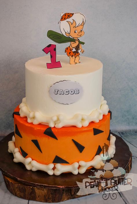 Flinstones bambam 2 tier birthday cake Flinstones Birthday Cake Bam Bam, Flintstone 1st Birthday Party, Flinstones Birthday Party Ideas, Bam Bam Birthday Cake, Flintstone Birthday Cake, Flintstones Birthday Cake, Yabba Dabba Doo Birthday, Bambam Birthday Party Ideas, Flinstones Birthday Party Boy