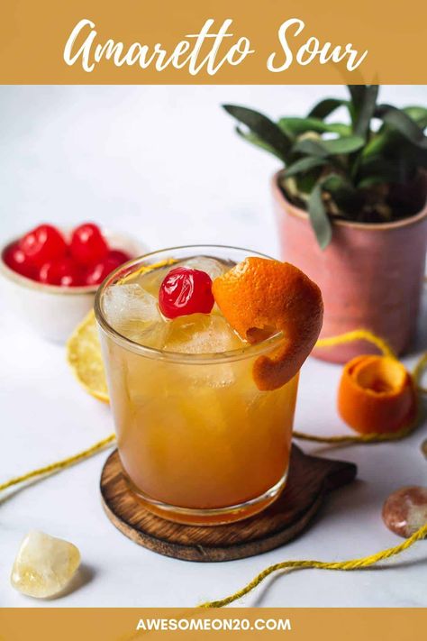 An Amaretto Sour is a classic cocktail for a good reason. It's extremely simple to make with only two ingredients, and it's deliciously tart. You'll want to sip one all the time. #cocktailrecipe #easycocktails #amarettosour Amaretto Sour Recipe, Amaretto Sour, Classic Cocktail, Easy Cocktails, Maraschino Cherry, Classic Cocktails, Easy Homemade, Liqueur, Cocktail Recipes