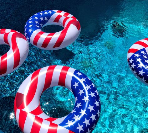 4th of July pool party planning starts with red, white and blue swim rings. Use them as pool party decorations and swimming pool games. 4thofjulypoolparty 4thofjulypoolfloats Pool Party 4th Of July, Outdoor 4th Of July Party, 4th Of July Pool Party Ideas Decorations, Fourth Of July Pool Party Ideas, 4 Of July Party Ideas, 4th Of July Party Ideas Decorations, Fourth Of July Party Aesthetic, 4th Of July Pool Party Ideas, Fourth Of July Party Ideas Decorations