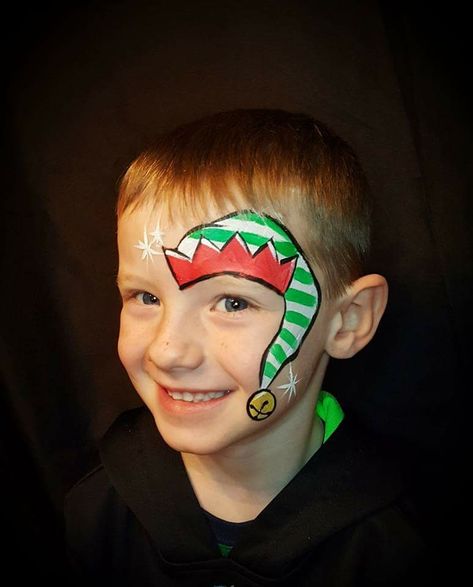 Small Christmas Face Paint Ideas, Easy Grinch Face Paint For Kids, Boys Christmas Face Paint, Christmas Lights Face Paint, Quick Christmas Face Painting, Grinch Face Paint Easy, Elf Face Painting, Christmas Facepainting Kids Easy, Xmas Face Painting