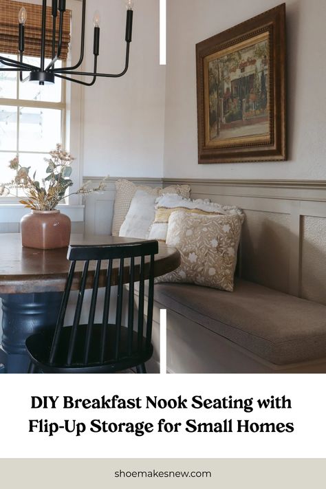 Cozy breakfast nook with cushions, flip-up storage, and a decorative painting on the wall. Breakfast Nook Plans, Small Kitchen Booth, Ikea Breakfast Nook Hack, Kitchen Nook Storage, Small Banquette Seating In Kitchen, Breakfast Area Ideas, Tiny Breakfast Nook, Small Banquette Seating, Small Banquette