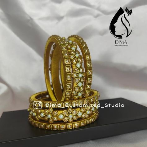 ✨ Elegance redefined. ✨ This stunning Golden Silk Thread Kundan Bangle is a masterpiece of craftsmanship. The intricate Kundan work shimmers on the base of luxurious gold silk thread, creating a piece that is both timeless and unforgettable. #goldthreadbangle #kundanbangle #kundanjewelry #handmadejewelry #jewelryoftheday #instastyle #fashion #beauty #elegance #indianjewelry #bridaljewelry #weddingjewelry #shopsmall #supportlocal Bangle Collection, Creative Videos, Kundan Work, Kundan Bangles, Silk Thread Jewelry, Silk Thread Bangles, Thread Bangles, Thread Jewellery, Clay Jewellery