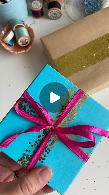 Emma West on Instagram: "Eco-friendly glitter, plastic-free tape and pops of colour- oh, my! 😍

Dare to be different with your gift wrapping- decorate gift boxes with unconventional things- the more fun you have wrapping the gift, the more impressive it’ll look! 

Plant based sellotape purchased on amazon 
Plant based glitter (plastic free!) from @eco_brd_ocean_safe 
Ribbon -repurposed from an old top 

#giftwrappingideas #giftwrappingskills #giftwrappinginspiration #plasticfreeliving #plasticfreelife #plasticfreeuk" Amazon Plant, Decorate Gift Boxes, Dare To Be Different, Be Different, Plastic Free, Gift Boxes, The Gift, More Fun, Plant Based