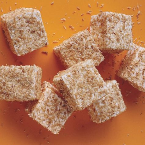 We often relegate marshmallows to a hot-chocolate topper, but these coconut treats definitely deserve to be offered up solo. Each pillowy square is surrounded by a flurry of toasted coconut. And since they keep for          a month, they can be made well in advance of the holiday rush. Marshmallow Squares, Coconut Squares, Chocolate Toppers, How To Make Marshmallows, Square Recipes, Recipes With Marshmallows, Christmas Candy Recipes, Homemade Marshmallows, Edible Gifts