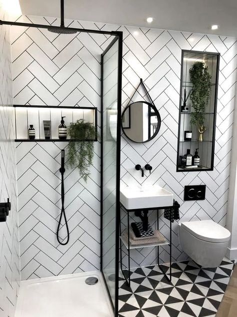 a small contemporary bathroom with herringbone clad tile walls, a printed floor, a small sink and a shower with a glass divider Bilik Air Kecil, Modern Bathroom Design Grey, Contemporary Bathroom Inspiration, Grey Modern Bathrooms, Design Interior Baie, Hiasan Dalaman Rumah, Dekorere Bad, Bilik Air, Bilik Mandi