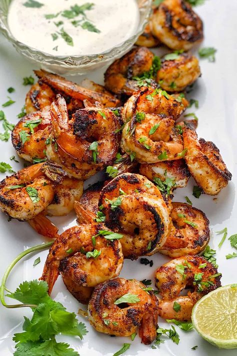 a bunch of sautéed shrimp on a platter with a bowl of remoulade dipping sauce and half a lime Appetizers Shrimp, Ragin Cajun, Goat Cheese Appetizer, Cucumber Raita, Cheese Appetizer, Caprese Skewers, Remoulade Sauce, Shrimp Appetizers, Sauteed Shrimp