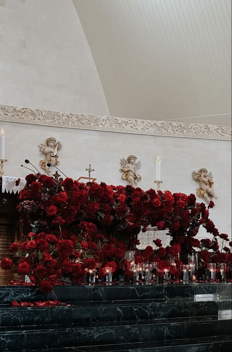 Stylish red, burgundy and maroon altar table at a Roman Catholic Church Scorpio Wedding, Dark Red Wedding, 2025 Bride, Juliet 1996, Dark Victorian, Red Rose Wedding, Church Wedding Decorations, Altar Decor, Altar Table