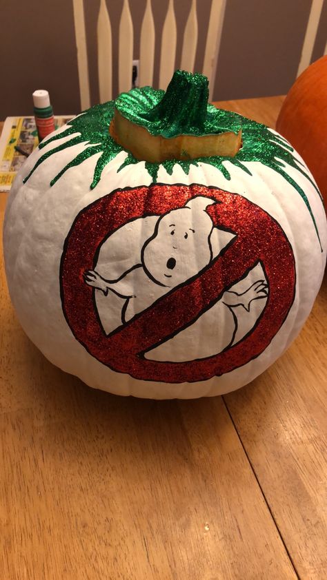 Ghostbusters painted pumpkin Ghostbusters Pumpkin Carving, Ghostbuster Pumpkin, Ghost Busters Pumpkin Painting Ideas, Marvel Pumpkin Painting, Ghostbusters Pumpkin Painting, Halloween Movie Pumpkin Painting, Ghostbusters Pumpkin, Pumpkin Carving Ghostbusters, Ghostbusters Painted Pumpkin