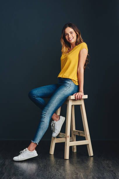 13,929 Woman Stool Stock Photos, Pictures & Royalty-Free Images - iStock Indoor Senior Pictures, Western Fashion Photoshoot, Female Modeling Poses, Female Portrait Poses, Graduation Photography Poses, Chair Pose, Senior Portrait Poses, Woman Posing, Studio Poses