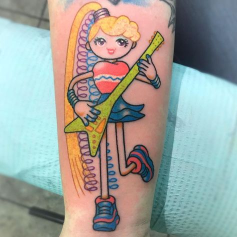 25 Playful Toy Tattoos That Will Make You Feel Like a Kid Again | Toy tattoos are a thing and they celebrate the most beloved childhood items that we all know and played with growing up. See if you have played with them all! Lifestyle 90s Tattoo Ideas, Betty Spaghetti, Tattoos Colorful, Black Ink Tattoo, Barbie Tattoo, 90s Tattoos, Colorful Tattoos, Bright Tattoos, Retro Tattoos