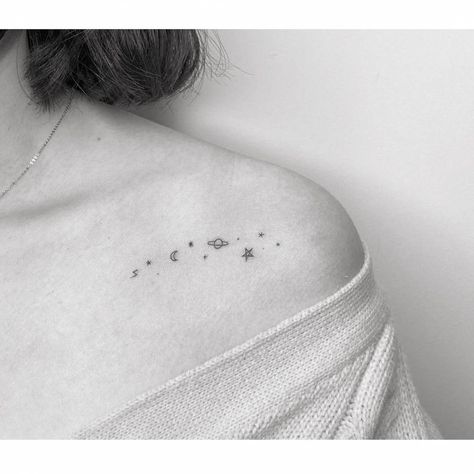 Minimalist galaxy tattoo on the shoulder Simple Galaxy Tattoo, Small Galaxy Tattoo, Puzzle Piece Tattoos, Galaxy Tattoo Ideas, Collar Bone Tattoos For Women, Galaxy Tattoos, Puzzle Tattoos, Universe Tattoo, Planet Tattoos