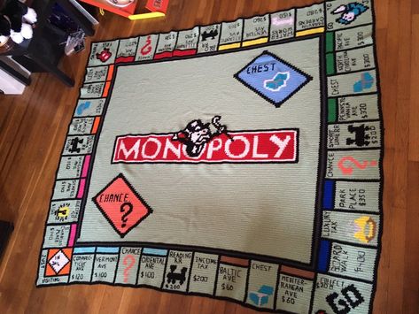 This Crocheted Monopoly Throw Transcends All Blankets Before and Forevermore #crochet #monopoly #bestgiftever Crochet Monopoly, Crochet Board Games, Gaming Crochet, Fandom Crochet, Crochet Games, Game Crochet, Giant Blanket, Giant Crochet, Lucky Ducky