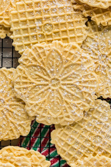 This Italian Pizzelle recipe is a classic Christmas cookie flavored with either vanilla or anise that we all know and love. They're super easy to make with a light and slightly crispy texture you won't be able to get enough of this holiday season! Pitzells Recipe Anise, Vanilla Pizzelle Recipe, Pitzells Cookies Recipe, Italian Easter Recipes, Pizzelle Cookies, Pizzelle Recipe, Italian Rainbow Cookies, Chewy Molasses Cookies, Italian Easter