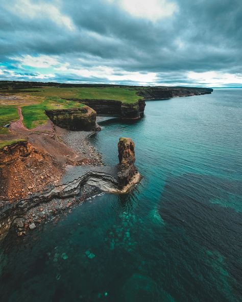 The land and sea meet at the shoreline, where the edge of the land touches the water. This area can be a beach, rocky cliffs, or a coastal plain. The meeting point is constantly changing due to the movement of tides, waves, and weather, which shape the coastline over time. It’s a dynamic place where land and water interact, creating unique habitats and environments. #nature #land #sea #coast #naturephotography Coastal Plain, Land And Sea, Sea Coast, By The Sea, The Land, Rocky, The Sea, Nature Photography, Water