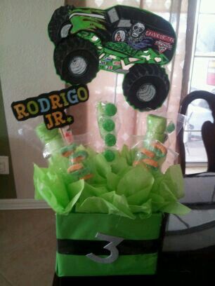 monster truck grave digger centerpieces Grave Digger Centerpiece, Monster Jam Birthday Party, Digger Birthday, Monster Jam Birthday, Monster Jam Party, Sixth Birthday, Cars Birthday Party Disney, Monster Truck Party, Monster Trucks Birthday Party