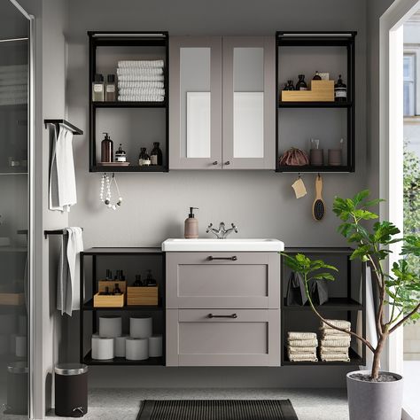 With grey as a base, you create a warm and cosy feeling. Perfect if you want a discreet colour that goes with everything. Modern or classic – you decide the style. The unique wedge dowels make assembly easy and the fittings are nearly invisible. You can easily add ENHET accessories to extend the use of your storage combination. And best of all – you don’t have to drill. Sold separately. This combination offers a harmonious mix of open and closed storage with lots of space to place the things oft Enhet Bathroom, Compact Bathroom Design, Small Bathroom Sinks, Small Bathroom Interior, Compact Bathroom, Ikea Bathroom, Basin Design, Bathroom Color, Mirror Cabinet