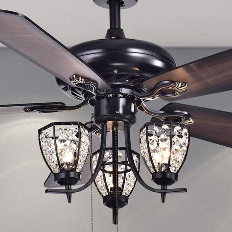 This 5 Blade Ceiling Fan, Light Kit Included is a lovely, traditionally styled fan with light assembly. The shades for the three lights remind you of the classic lamp posts from a simpler time. Matte black metal hardware and housing with wood blades combine to give your space a sense of comfort. Ceiling Fan Makeover, Fan Chandelier, Ceiling Fan Light Kit, Farmhouse Decorating, Ceiling Fan Light, Casa Exterior, Crystal Lighting, Room Renovation, Ceiling Fan Chandelier