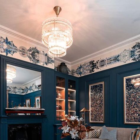 Timorous Beasties on Instagram: "Featured above the picture rail in @no4carlton contemporary, elegant lounge is our Totem Damask wallcovering in Black & Blue.  This wallpaper has a versatile design that can be used in both horizontal and vertical applications.  It’s kaleidoscopic pattern of arabesques, splats and florals gives an impression of movement and energy, while its geometric stem gives it a sense of stability.  Interior Designer @alexanderjamesinteriors  Client @no4carlton   ____________________ #totemdamask #commercialdesign #interiordesigners #wallpaperdesign #wallcoverings #boutiquehotel #timorousbeasties" Wallpaper Above Picture Rail, Picture Rail Living Room, Wallpaper On The Ceiling, Timorous Beasties Wallpaper, Elegant Lounge, Dado Rail, Wallpaper Ceiling, Timorous Beasties, Picture Rail