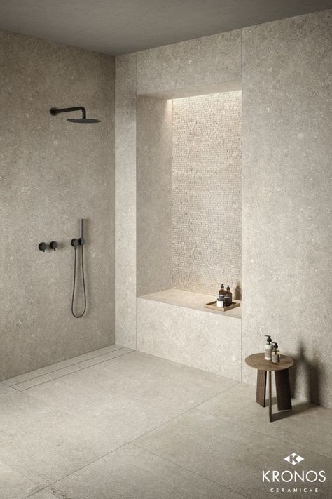 Shower Design ideas: custom shower tray made with limestone look porcelain tiles - Collection by Kronos Ceramiche: Terra Crea Pomice #kronostiles #kronosceramiche #madeinitaly #porcelaintiles #porcelainstoneware #gresporcellanato #grescerame #feinsteinzeug #tiles #luxurytiles #floortiles #flooringtiles #interiordesign #bathroom #moderndesign #showerdesign #bathroomfurniture #bathroomdesign #showertray #showerwall #bathroomfloor #bathroomwall #designer #archilovers #architect Stone Tile Bathroom, Shower Mosaic, Shower Wall Tile, White Tub, Floor Trim, Large Format Tile, Bathroom Shower Tile, Custom Shower, Bathroom Renos