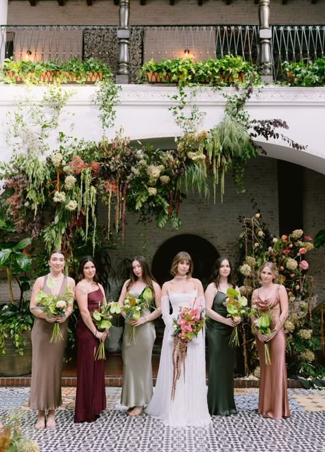 A Chic Whimsical Fairytale Forest Wedding Full of Overgrown Florals Whimsical Garden Wedding Bridesmaid, Purple And Green Bridesmaid Dresses, Botanical Wedding Dress, Fairytale Forest Wedding, Romantic Forest Wedding, Aesthetic Shots, Rose Gold Bridesmaid Dress, Garden Wedding Bridesmaids, Fairytale Forest