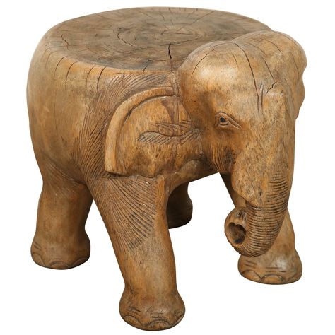 Hand-carved Elephant Stool | 1stdibs.com Celine's Office  PRICE:	$950 Purchase > CREATOR:	African- Tribal (Sculptor) IN THE STYLE OF:	Tribal COUNTRY:	Thailand DATE OF MANUFACTURE:	19th century MATERIALS:	wood CONDITION:	Distressed WEAR:	Wear consistent with age and use HEIGHT:	13.5 in. (34 cm) DIAMETER:	14 in. (36 cm) Diy Furniture To Sell, Wooden Birds, Elephant Table, Elephant Home Decor, Elephant Carving, Wooden Elephant, Carved Furniture, Elephant Decor, Elephant Lover