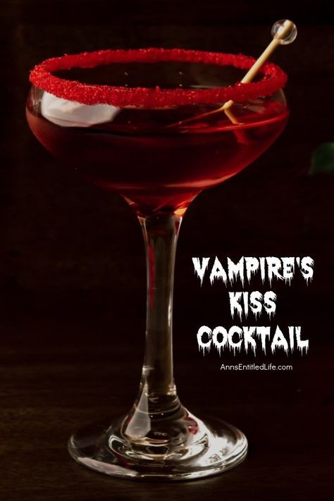 A vampire kiss cocktail against a dark background Halloween Drinks Alcohol Vampire, Vampire Themed Alcohol Drinks, Devils Kiss Drink, Vampire Inspired Drinks, Sourpuss Cocktails, Vampire Inspired Cocktails, Draculas Kiss Cocktail, Cruella Cocktail, Twilight Alcoholic Drinks