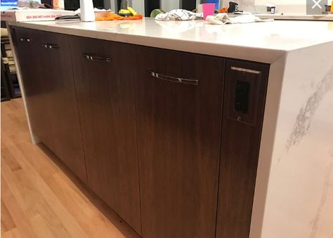 Power outlet in waterfall island - filler strip to allow outlet when island sides are covered Outlet In Island, Kitchen Island Outlets, Kitchen Island Outlet, Hidden Outlet, Kitchen Outlets, Waterfall Island Kitchen, Waterfall Countertop, Kitchen Island Tops, Waterfall Island