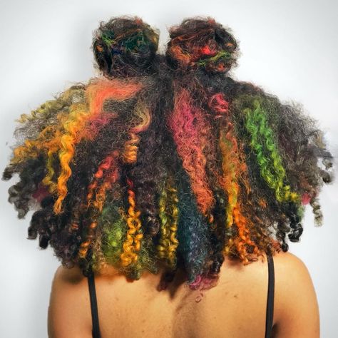 Rainbow dyed curly hair streaks Rainbow Curly Hair Black Women, Multi Colored Natural Hair, Curly Vivid Hair, Rainbow Hair Black Women, Rainbow Streaks In Hair, Curly Hair Streaks, Half Rainbow Hair, Afro Dyed Hair, Black And Rainbow Hair