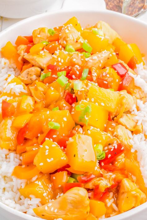 Hawaiian Pineapple Chicken Skillet— 🍗🍍🏝️Tender pieces of chicken are cooked with bell peppers and pineapple chunks, then coated in a SWEET and TANGY sauce! Pineapple chunks and pineapple juice create layers of tropical island flavor! This is a FAST and EASY recipe that’s ready in 30 minutes, made in a single skillet, and perfect for busy weeknights! Hawaiian Pineapple Chicken, Chicken And Pineapple, Stove Top Chicken, Pineapple Rice, Pineapple Chunks, Chicken Skillet, Bell Pepper Recipes, Hawaiian Chicken, Pineapple Recipes