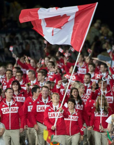 What a proud portrait of Simon Whitfield leading this amazing Canadian Olympic Team! [Twitter / CDNOlympicTeam] view this http://www.youtube.com/watch?v=v8DmwxRT7t4 Flag Bearer, Canadian Things, Olympic Theme, I Am Canadian, Summer Olympic Games, Olympic Stadium, London Summer, O Canada, Team Canada