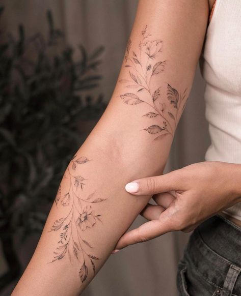 Tattoos✓ • Instagram Dainty Arm Sleeve Tattoos For Women, Lily Of The Valley Tattoo Arm Wrap, Lily Of The Valley Tattoo Arm, Thumb Tattoos For Women, Tattoo Arm Wrap, Marathon Tattoo, Arm Wrap Tattoo, Lily Of The Valley Tattoo, Ivy Tattoo