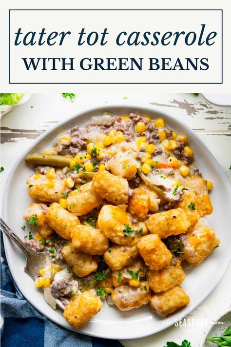 This tater tot casserole is a perfect family-friendly, easy dinner for busy nights! The cozy, one-dish meal includes ground beef, green beans, and corn in a creamy gravy, topped with a layer of melted cheddar cheese, and finished with crispy potatoes. Ground Beef Green Beans, Beef Green Beans, Green Beans And Corn, Dinner For Busy Nights, Picky Eaters Dinner, Tater Tot Hotdish, Beans And Corn, New Recipes For Dinner, Picky Kids