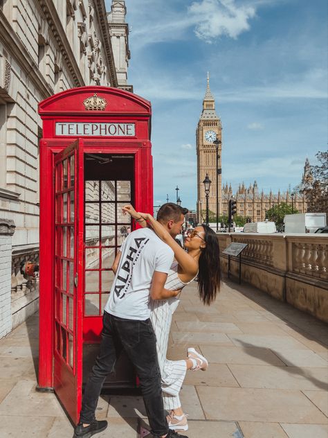 Travel couples posing in front of a red phone booth in London at the Big Ben. Summer, sunshine, matching white clothes, happy, smiling. Cute pose, 
Travel bloggers travel couple, exploring Europe, exploring UK, what to see in London, what to do in London, London photo spots
London, travel tips and tricks, travel ideas and inspiration, couple goals, travel couple, creative travel couple, creative couple, couple photography, couple photography ideas London Instagram Pictures Couple, Couple Photo London, London Photo Ideas Couple, Couple In London Aesthetic, London Couple Photos, London Couple Pictures, London Couple Aesthetic, London Instagram Pictures, Uk Pics