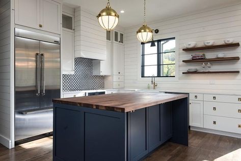 A dark blue island with a walnut countertop stands out amongst white shaker perimeter cabinetry and shiplap walls in a cottage kitchen. Walnut Kitchen Island, Cheap Kitchen Countertops, Walnut Countertop, Cheap Kitchen Remodel, Kitchen Remodel Countertops, Outdoor Kitchen Countertops, Cheap Countertops, Walnut Kitchen, Farmhouse Kitchen Design