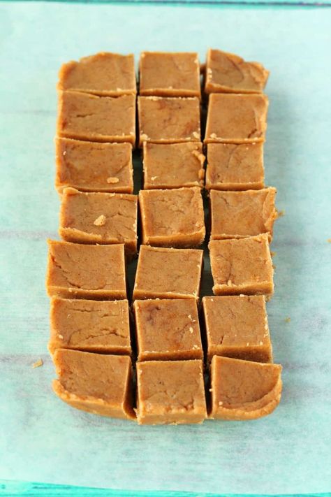 Super easy 4-ingredient almond butter fudge. Deliciously rich, creamy and smooth and you can make it in minutes! Vegan and gluten-free. | lovingitvegan.com Almond Butter Fudge, Butter Fudge, 4 Ingredient, Almond Butter, Parchment Paper, 4 Ingredients, Vegan Desserts, Simple Ingredient, Vegan Vegetarian