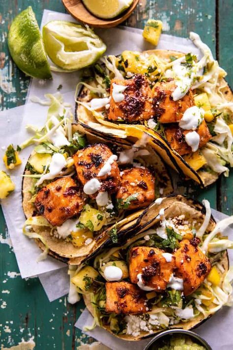 Sheet Pan Chipotle Salmon Tacos with Pineapple Jalapeño Salsa | halfbakedharvest.com Half Baked Harvest Salmon, Burrito Board, Chipotle Salmon Tacos, Chipotle Salmon, Salmon Tacos Recipe, Jalapeño Salsa, Tacos With Pineapple, Pescatarian Meals, Half Baked Harvest Recipes