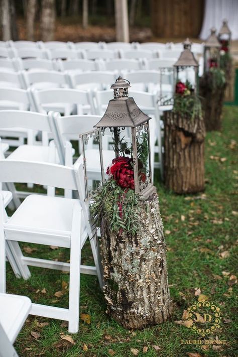 Isle Decor For Outdoor Wedding, Wood Aisle Wedding, Wedding Aisle Wood Stumps, Wedding Aisle Lanterns Outdoors, Winter Wedding Isles Decoration Outdoor, Outdoor Christmas Wedding Ceremony, Forest Wedding Aisle Decor, Lantern Decor Wedding Aisle, Lantern Aisle Decor Outdoor Ceremony