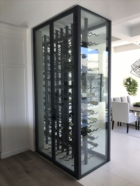 Iron and glass chilled wine cabinet Wine Chiller Cabinet, Cellar Ideas, Glass Wine Cellar, Wine Closet, Club Furniture, Home Wine Cellars, Above Cabinets, Spilled Wine, Wine Stains