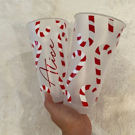 This item is not dishwasher safe, please hand wash only! This cup can only be used with cold drinks. Do not soak or scrub the vinyl.  Leave your name, chosen font and vinyl colour in the customisation box. Comes with straw and lid. Any questions drop me a message! Happy Shopping x SVG by MilkMilkSugar Starbucks Christmas Cups, Christmas Eve Crate, Christmas Starbucks, Starbucks Diy, Christmas Cups, Creative Christmas Trees, Starbucks Christmas, Candy Cane Christmas, Reusable Coffee Cup