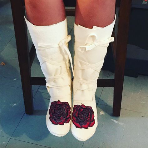 White leather, high top wrap moccasins red purple roses By:ZHorne MHA Nations Wrap Moccasins, Knee High Moccasins, White Moccasins, Moccasins Outfit, 2024 Wedding, Purple Roses, Red Purple, Ugg Boots, Moccasins