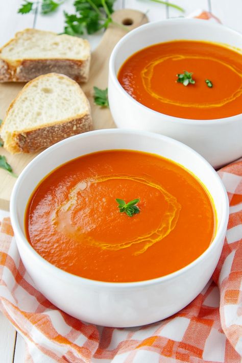 Indulge in a warm bowl of comforting carrot and tomato soup, perfect for chilly days or when you need a nourishing meal. This simple yet flavorful soup is packed with vitamins and antioxidants from fresh vegetables. Whether you're looking for a quick lunch or a cozy dinner option, this recipe is easy to make and will surely satisfy your cravings. Serve it with some crusty bread or a side salad for a complete and wholesome meal that will keep you warm from the inside out. Carrot And Tomato Soup, Carrot Tomato Soup, Wednesday Dinner, Fresh Tomato Soup, Dinner Friends, Tomato Soup Homemade, Tomato Soup Recipe, Roasted Tomato Soup, Cozy Dinner