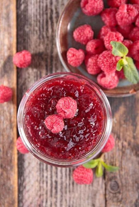 We have several raspberry bushes, so I freeze the berries to make a reduced sugar raspberry jam recipe. I use it to naturally flavor my yogurt for a delicious treat. Pectin needs to have sugar in order to create a gel. If you try to reduce the sugar in a jam recipe, it won't set right. You can use Sure Jell for low or no sugar recipes to reduce the sugar. A traditional recipe calls for 5 cups of fruit and 7 cups of sugar. This is a reduced sugar recipe with 5 cups of fruit and… Low Sugar Raspberry Jam, No Sugar Recipes, Low Sugar Jam Recipes, Chia Seed Jam Recipe, Raspberry Bushes, Low Sugar Jam, Raspberry Jam Recipe, Raspberry Bush, Chia Seed Jam